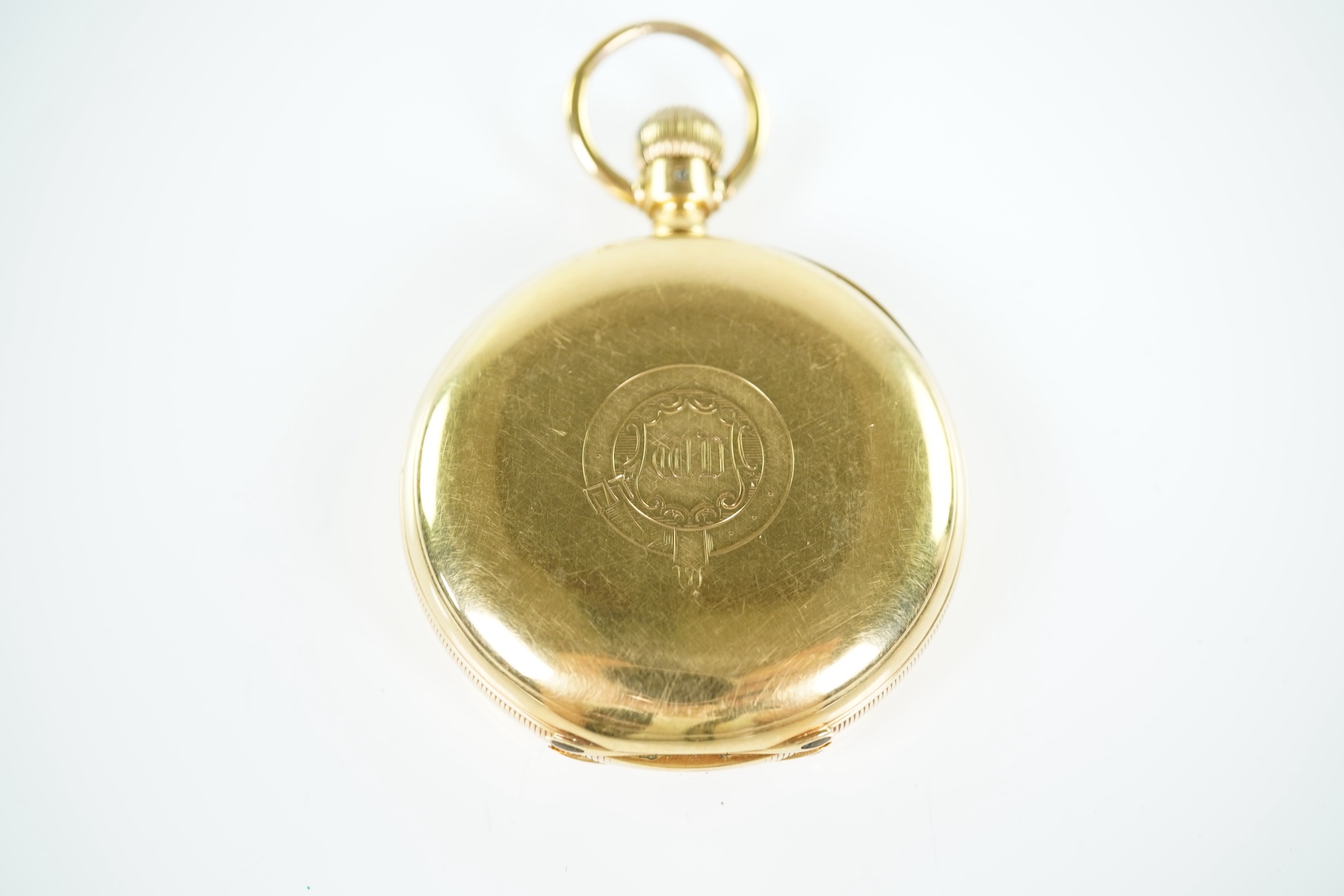A late Victorian engine turned 18ct gold open faced keyless pocket watch by The American Waltham Watch Company
